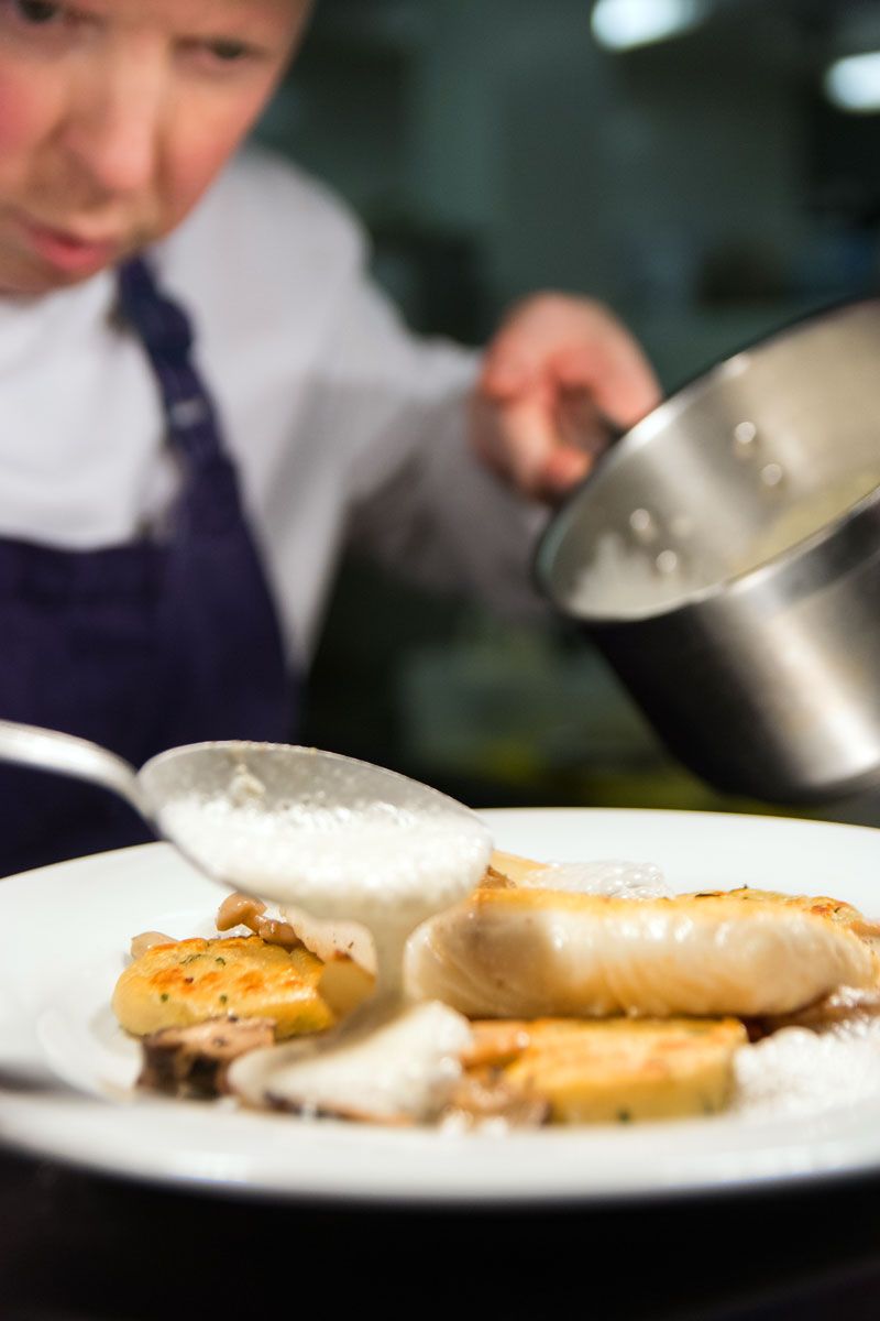 Head Chef Kieran Murphy preparing a dish for Gallagher's Seafood Restaurant